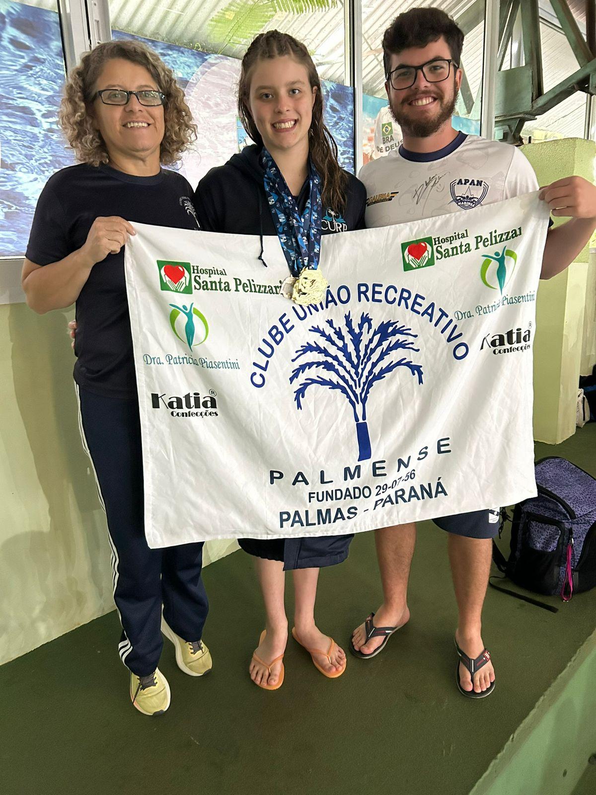 Atleta e seus treinadores
